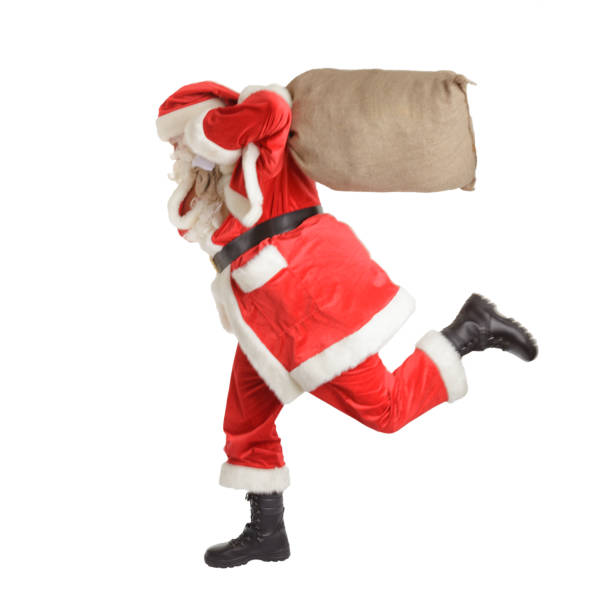 istock Hurried Santa Claus is running fast. Isolated on white background 1028772804