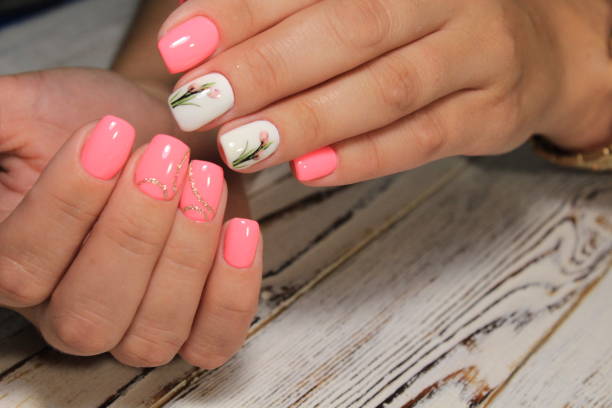 istock Stylish manicure nails color black and silver 1028775842