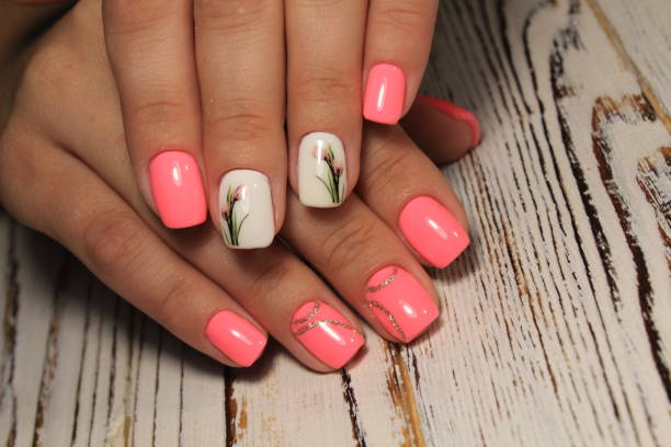 istock Stylish manicure nails color black and silver 1028776004