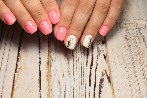 istock Stylish manicure nails color black and silver 1028776026