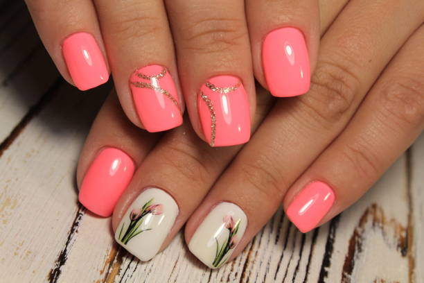 istock Sexual pink manicure on beautiful female hands 1028776236