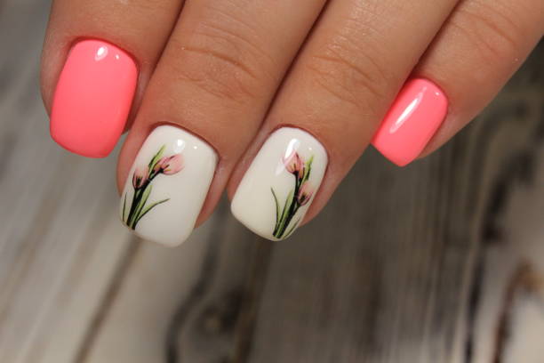 istock Sexual pink manicure on beautiful female hands 1028776982