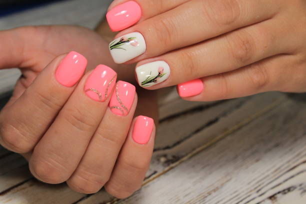 istock Sexual pink manicure on beautiful female hands 1028777036