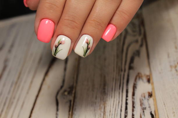 istock Sexual pink manicure on beautiful female hands 1028779194
