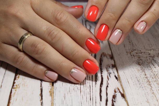 istock Cute manicure on female hands. 1028786630