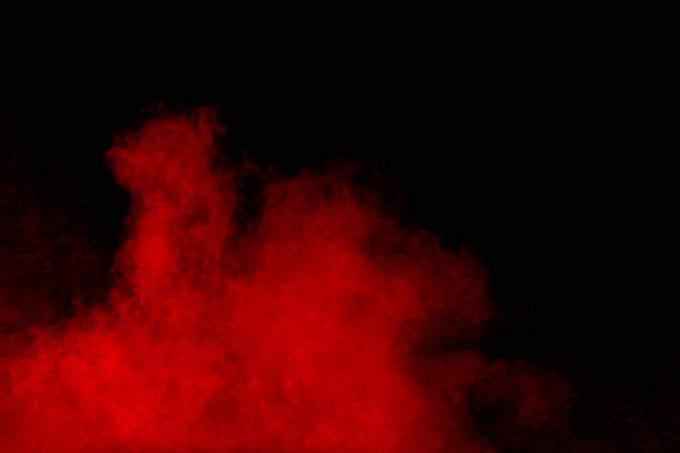 istock abstract red dust explosion on  black background.Freeze motion of red powder splash. 1028790962