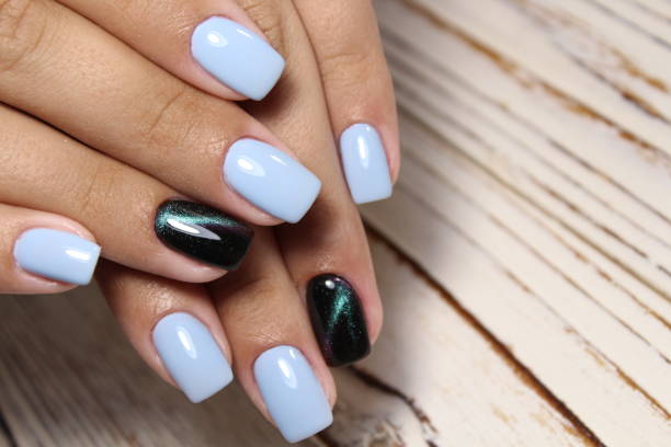 istock Manicured nails Nail Polish art design. 1028791242