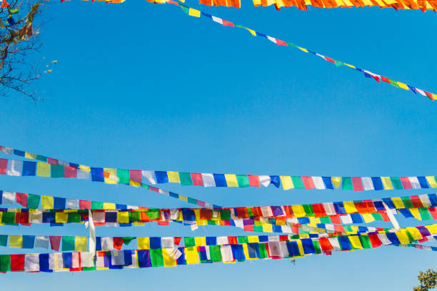 istock Colorful Prayer flags and blue sky 1028791524