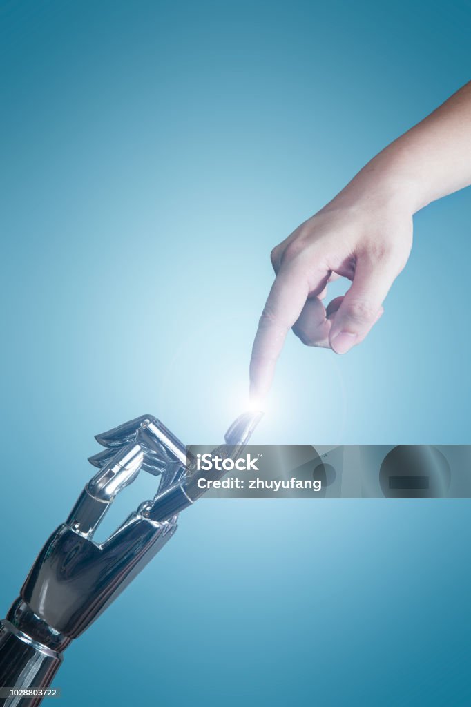 Artificial intelligence Human hand touching with robot Artificial Intelligence Stock Photo