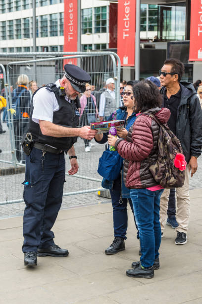 London, January 26, 2020. British Police officers patrolling the streets of England wearing stab vests.