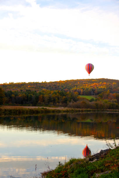 istock hot air ballon over a pond 1028821366