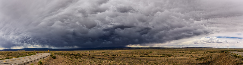 Utah road and incoming storm, panorama
