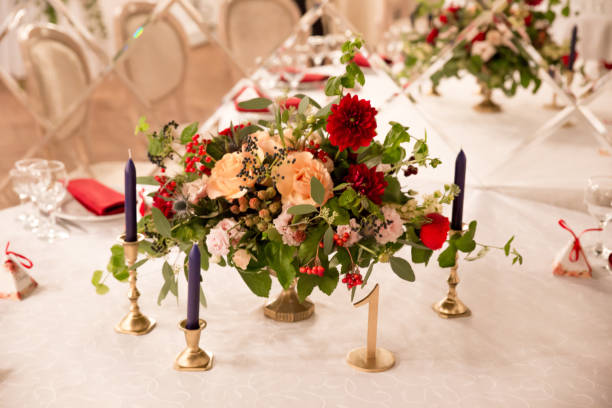 istock table decor for wedding ceremony, table setting, flowers, red and white decor 1028830392
