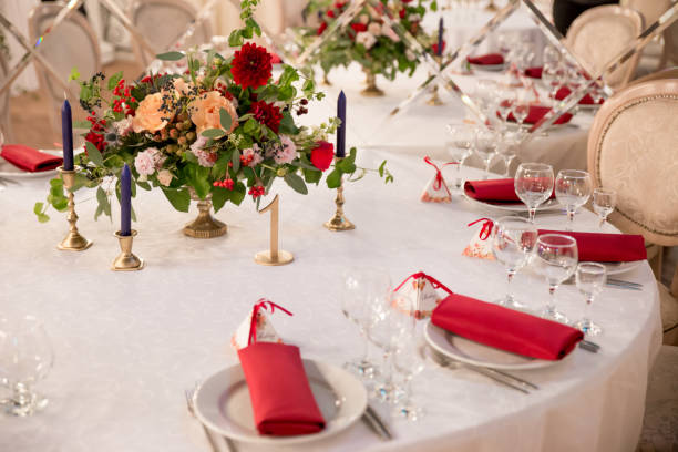 istock table decor for wedding ceremony, table setting, flowers, red and white decor 1028830412