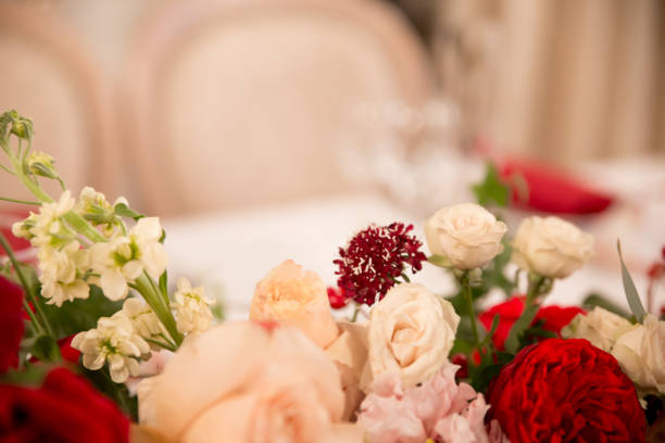 istock table decor for wedding ceremony, table setting, flowers, red and white decor 1028830442