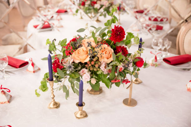 istock table decor for wedding ceremony, table setting, flowers, red and white decor 1028830570