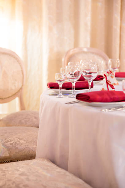 istock table decor for wedding ceremony, table setting, flowers, red and white decor 1028830600
