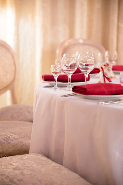 istock table decor for wedding ceremony, table setting, flowers, red and white decor 1028830638