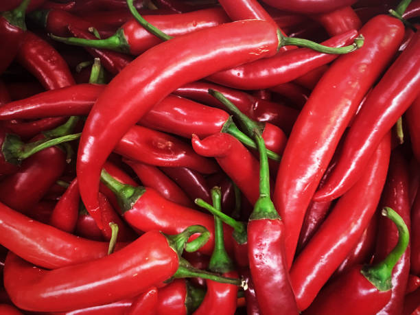 istock Heap Of Ripe Big Red Peppers 1028833722