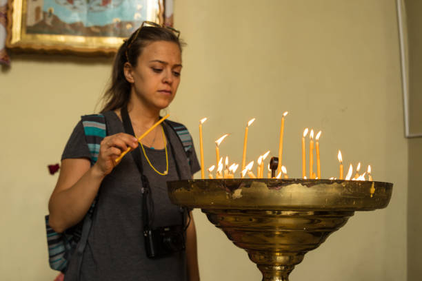istock Young woman with candles 1028834428