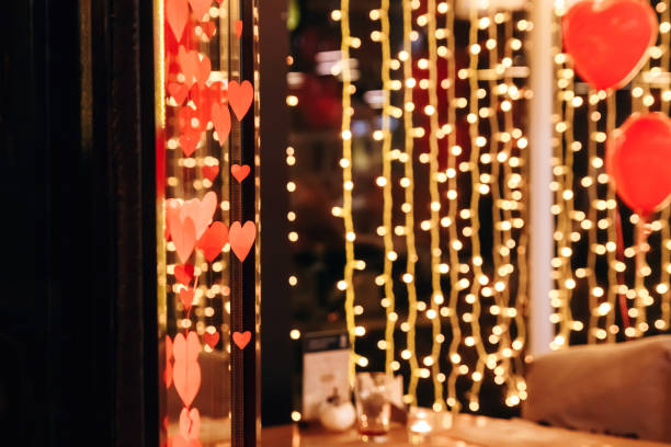 istock Abstract bokeh background of Christmas lights. Toned image 1028854324