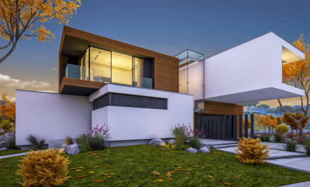istock 3d rendering of modern cozy house by the river. Cool autumn evening with soft light. 1028861566