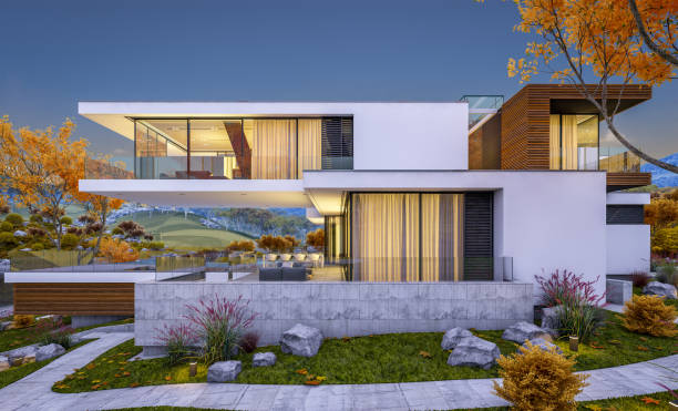istock 3d rendering of modern cozy house by the river. Cool autumn evening with soft light. 1028861592