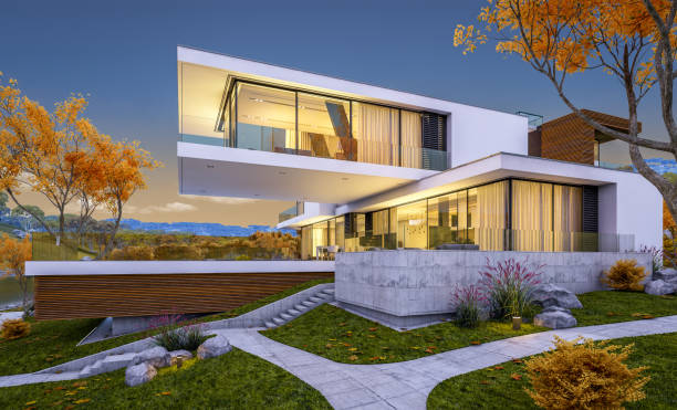 istock 3d rendering of modern cozy house by the river. Cool autumn evening with soft light. 1028861618