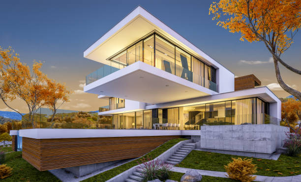 istock 3d rendering of modern cozy house by the river. Cool autumn evening with soft light. 1028861678
