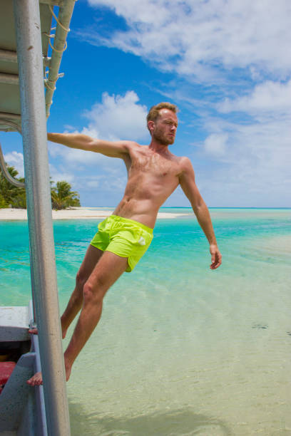istock Caucasian man standing in a tropical beach 1028869372