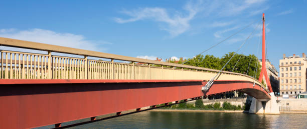 istock red suspension footbridge over the Saone river 1028873510