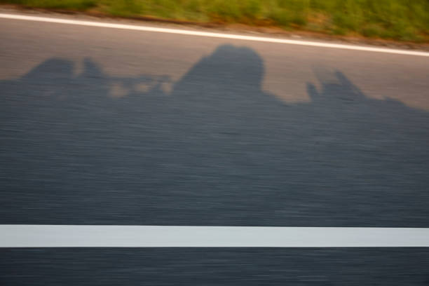 Shadow of a couple in an vintage car