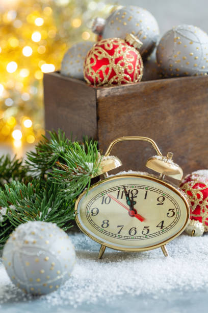istock Christmas card with clock and Christmas decor. 1028882774