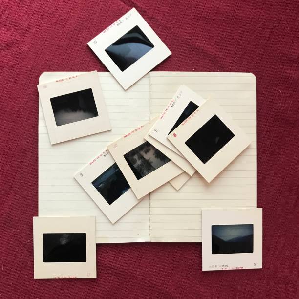 istock Old Photo Slides and Notebooj 1028885618