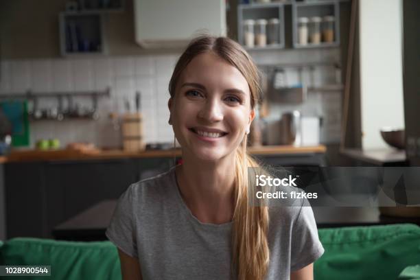 Smiling Woman Talking By Videocall Dating Online Looking At Camera Stock Photo - Download Image Now