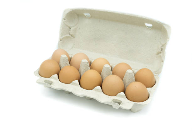 istock Opened egg carton with ten eggs isolated on white background 1028901202