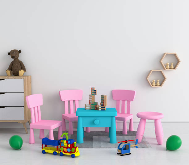 istock table and chair in white child room for mockup, 3D rendering 1028909870