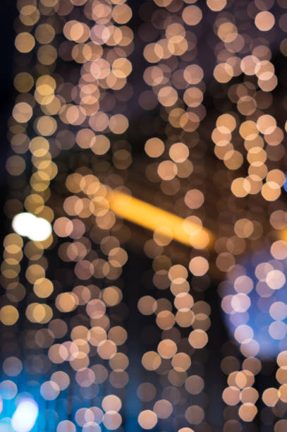 istock Color bokeh, defocused light bulb. 1028925974