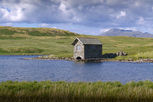 istock Boathouse on the Lake 1028933986