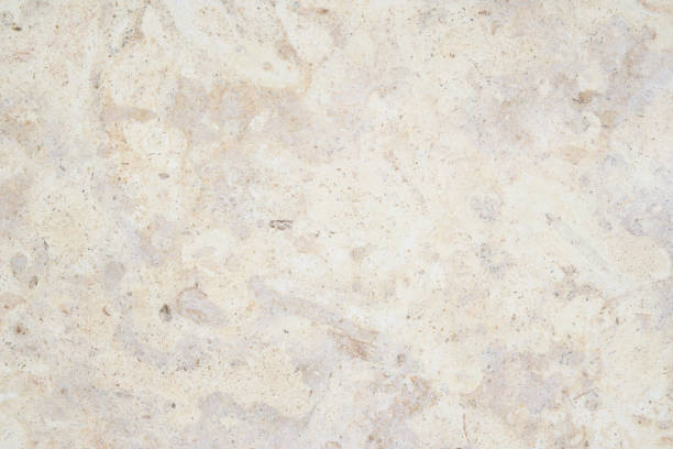 istock Beautiful high detailed beige marble with abstract natural pattern. 1028934534