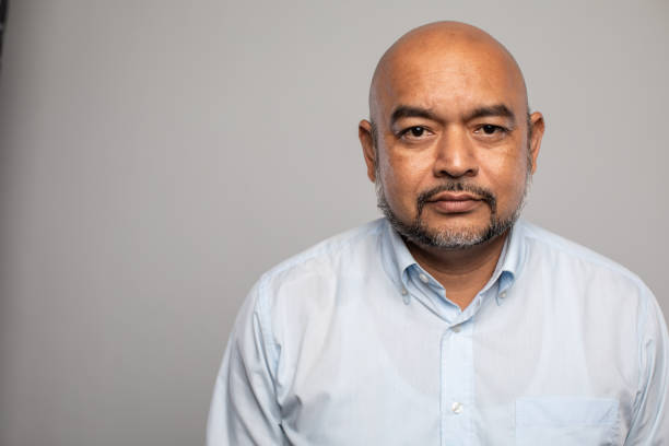 istock Studio shot of Serious Malaysian man 1028934870