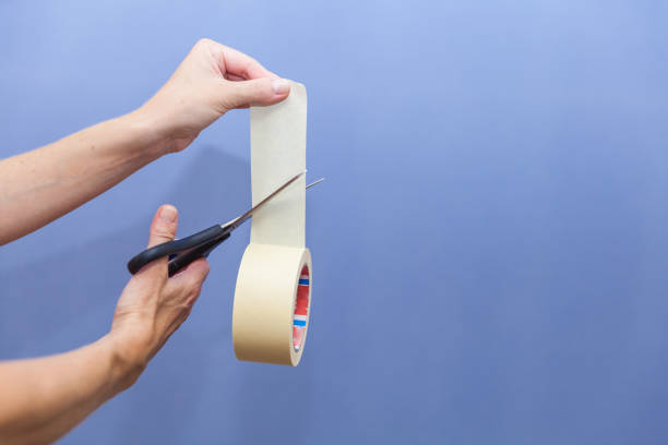 istock Editing a blue background on the wall for a photo studio 1028939360