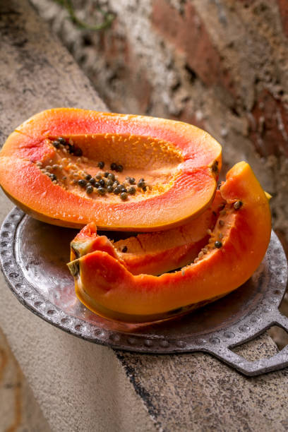 papaya on a metal tray