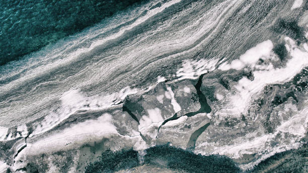 istock Icy water by the shore 1028944828