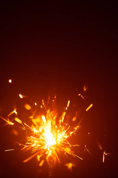 istock Christmas background with sparkler light and copy-space 1028957602