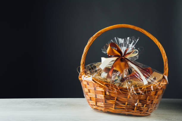 gift basket on gray background gift basket on gray background with copy-space basket stock pictures, royalty-free photos & images