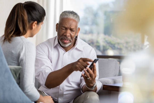 istock Senior man learns to use smartphone 1028962008
