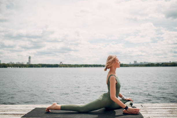 istock Young woman doing yoga practice 1028962152