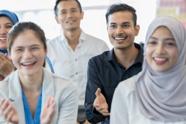 istock Cheerful group of businesspeople 1028962430