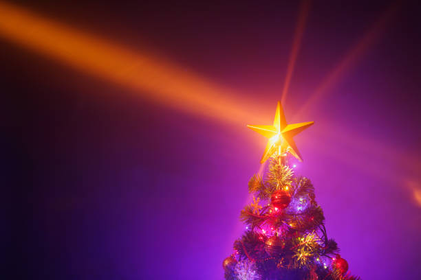 istock Christmas tree with festive lights 1028966274